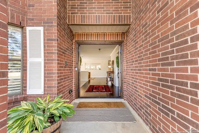 a view of a brick wall with living room