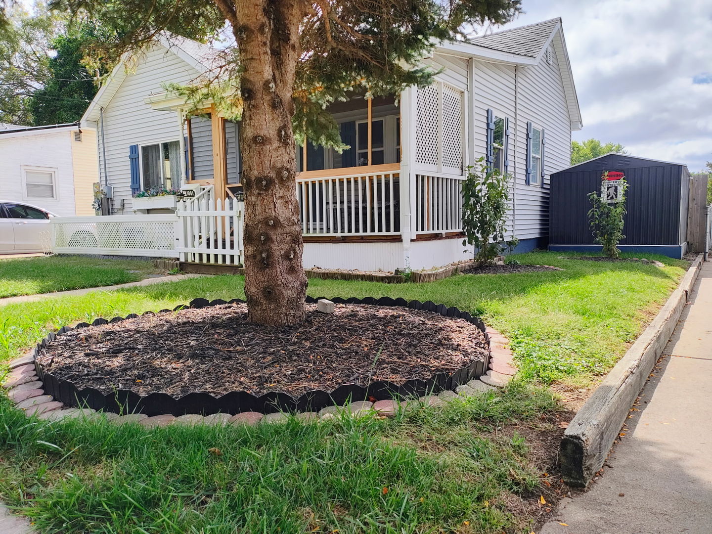 1041 West Dakota Street Spring Valley, IL 61362 - Photo 3 of 15 a view of a house with a yard and a garden