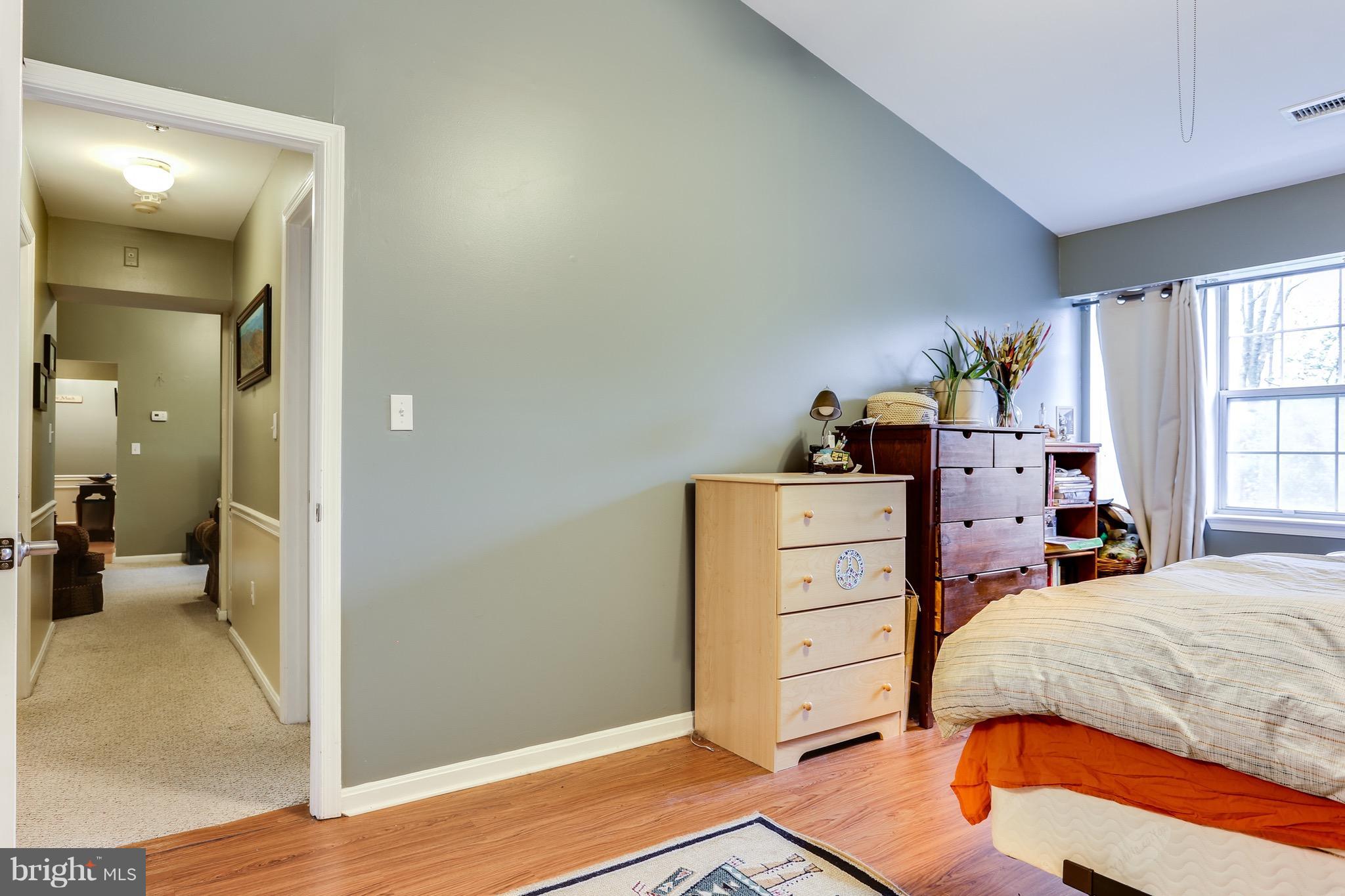 8589 Falls Run Road, Unit K Ellicott City, MD 21043 - Photo 12 of 17 Vaulted ceiling in master bedroom