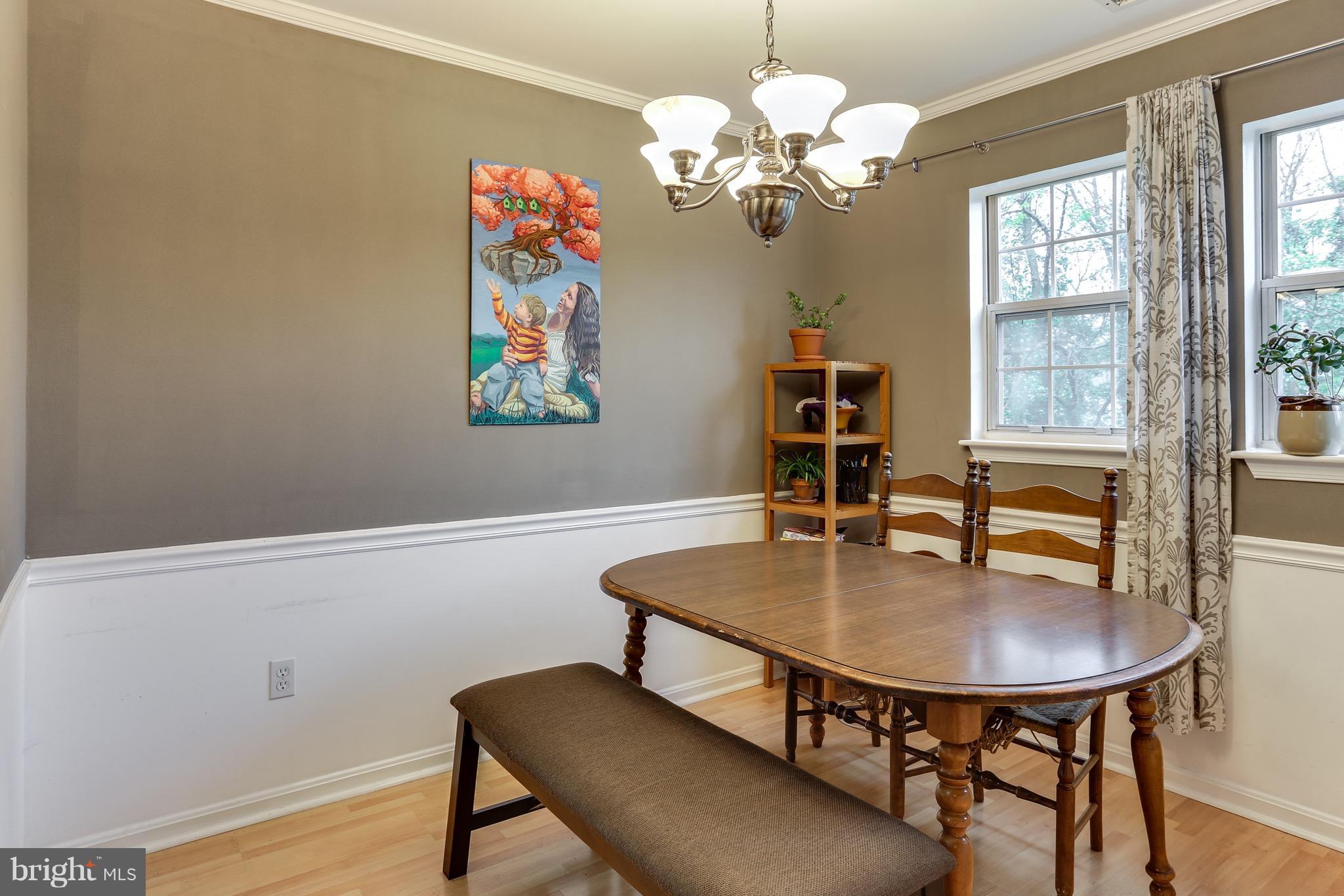 8589 Falls Run Road, Unit K Ellicott City, MD 21043 - Photo 10 of 17 Dining Room with chair moulding