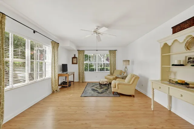 a kitchen with cabinets and window