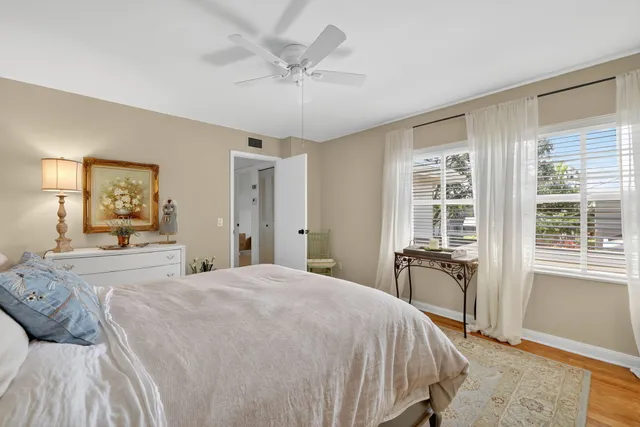 a view of a room with a table and chairs