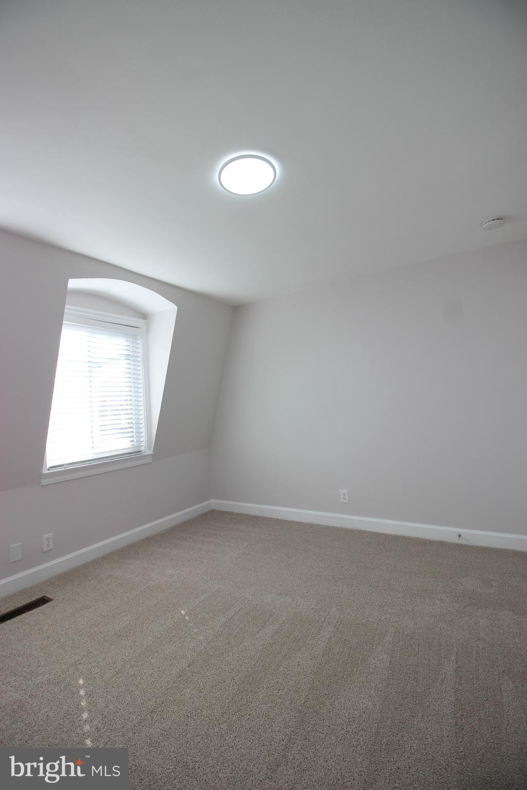 1218 Eton Court Northwest Washington, DC 20007 - Photo 15 of 22 an empty room with a window