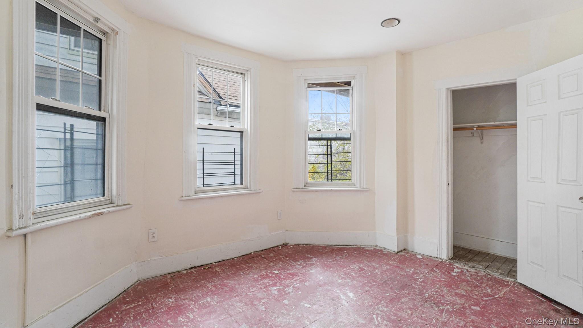 111 South Fulton Avenue Mount Vernon, NY 10550 - Photo 12 of 19 Unfurnished bedroom with a closet and baseboards