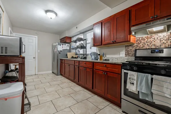$395,000 | 6825 South Rockwell Street, Chicago, IL 60629