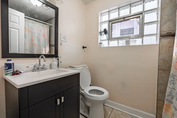 $395,000 | 6825 South Rockwell Street, Chicago, IL 60629