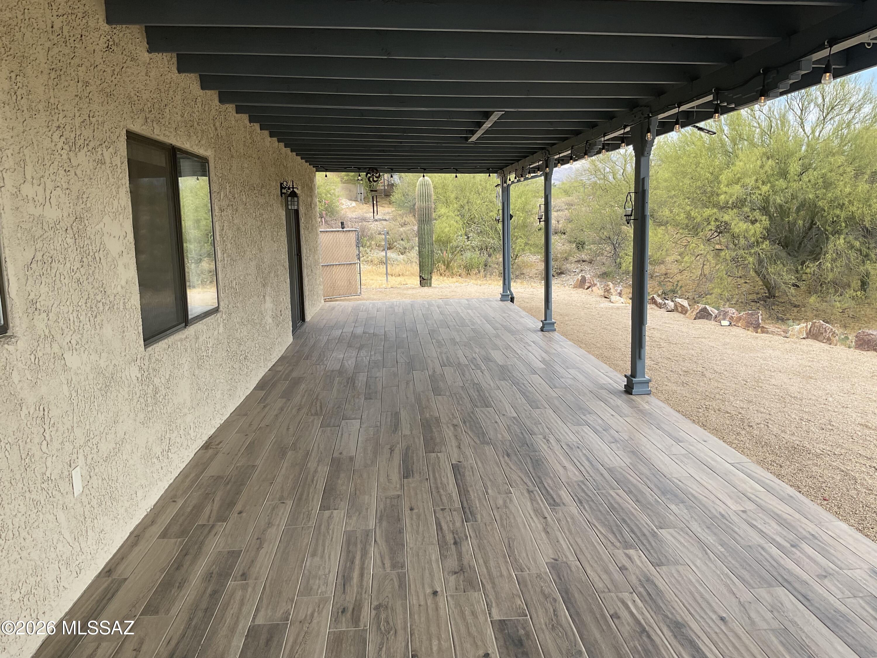 4060 North Swan Road Tucson, AZ 85718 - Photo 32 of 47 a view of porch with green space