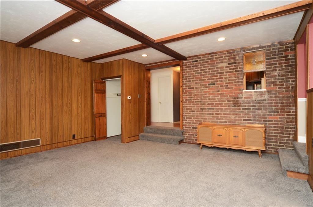 517 Old Farm Road Pittsburgh, PA 15234 - Photo 12 of 24 Another lovely feature in this large Den is the brick accent wall!