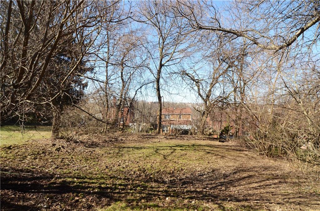 517 Old Farm Road Pittsburgh, PA 15234 - Photo 24 of 24 Deep, level yard with tree boarder which helps provide privacy in the spring & summer!