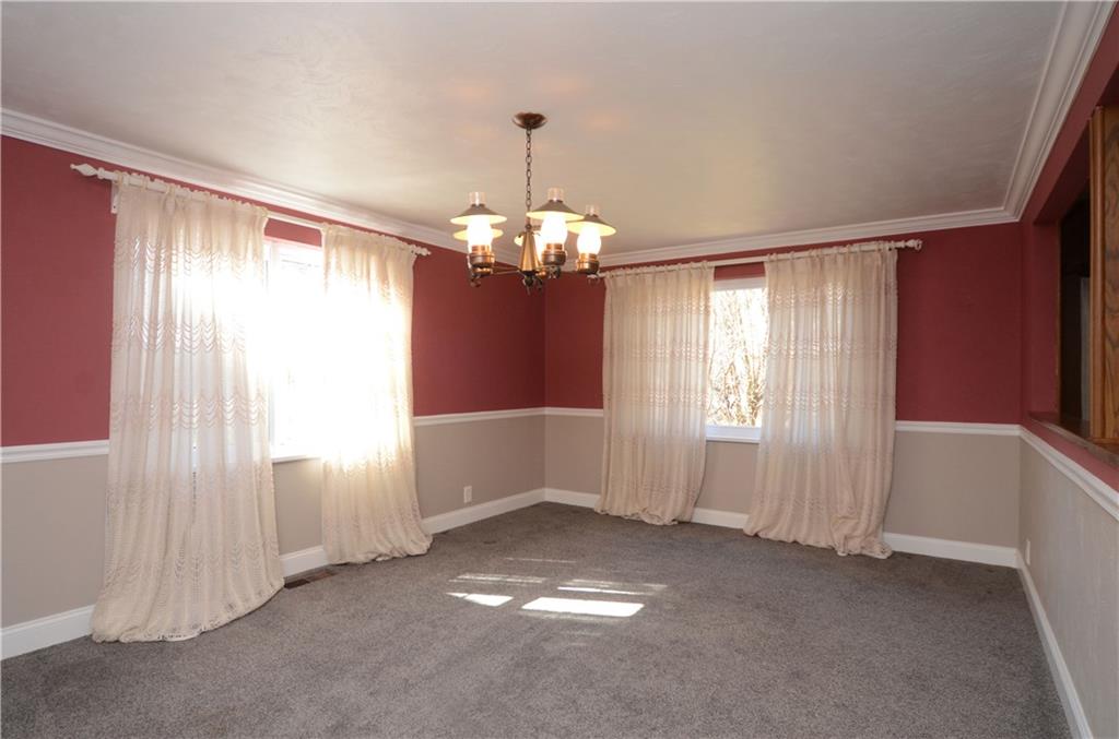 517 Old Farm Road Pittsburgh, PA 15234 - Photo 9 of 24 Spacious Dining room with chair rail trim & crown moulding.