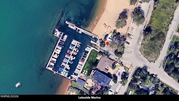 a sign broad on the side of the road