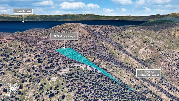 a view of a street with a building in the background