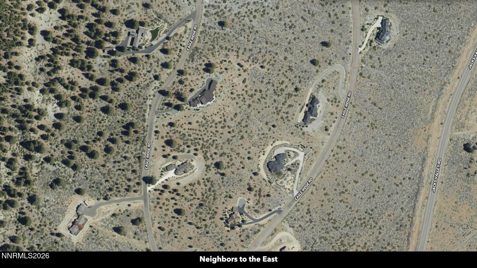 0 Genoa Peak Road Genoa, NV 89411 - Photo 46 of 64 a bathroom with a shower curtain