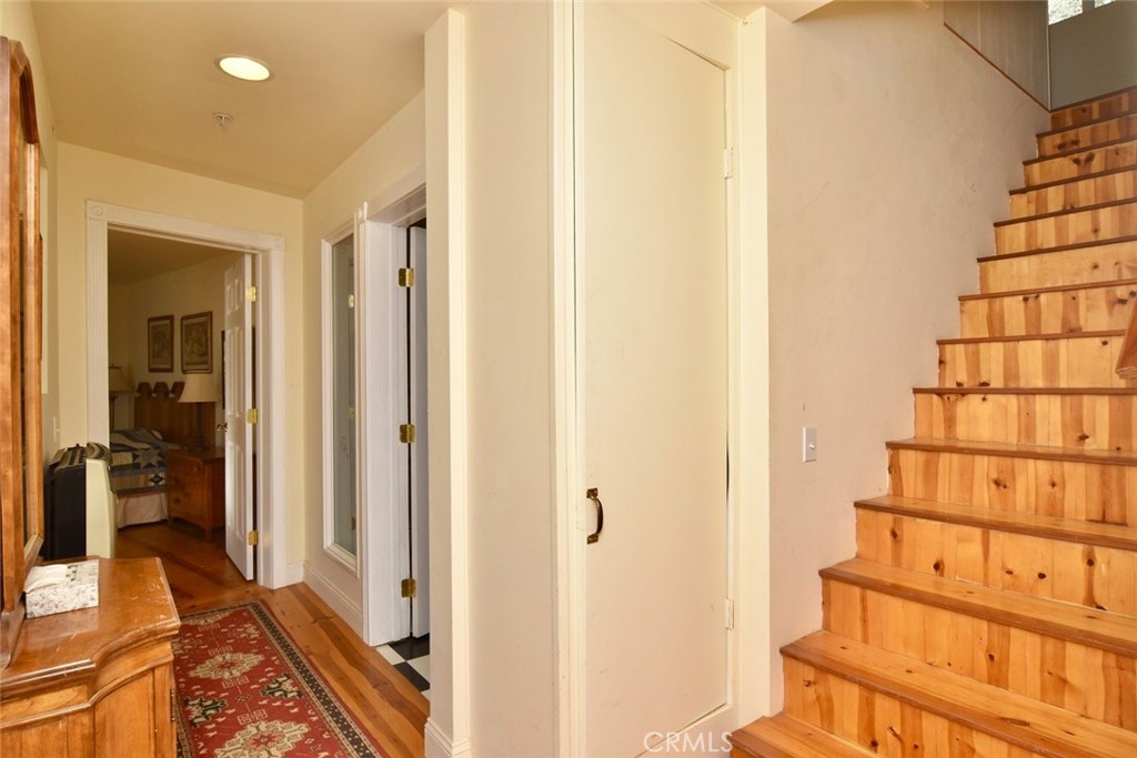 76450 Deer Pass Road Bradley, CA 93426 - Photo 18 of 50 a view of a hallway with wooden floor and living room