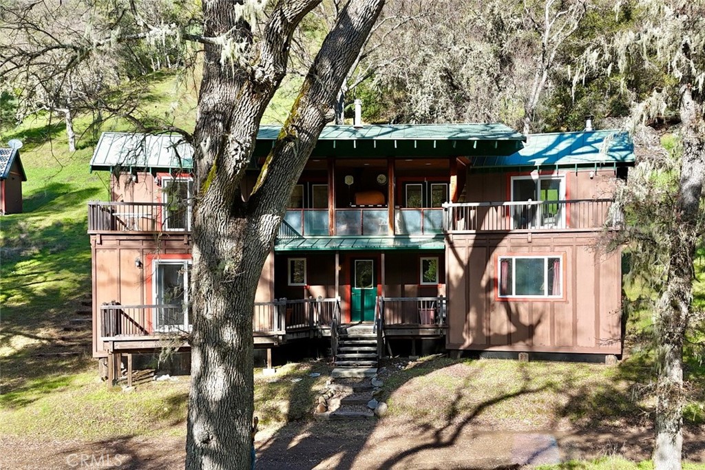 76450 Deer Pass Road Bradley, CA 93426 - Photo 24 of 50 a view of a house with street next to a building