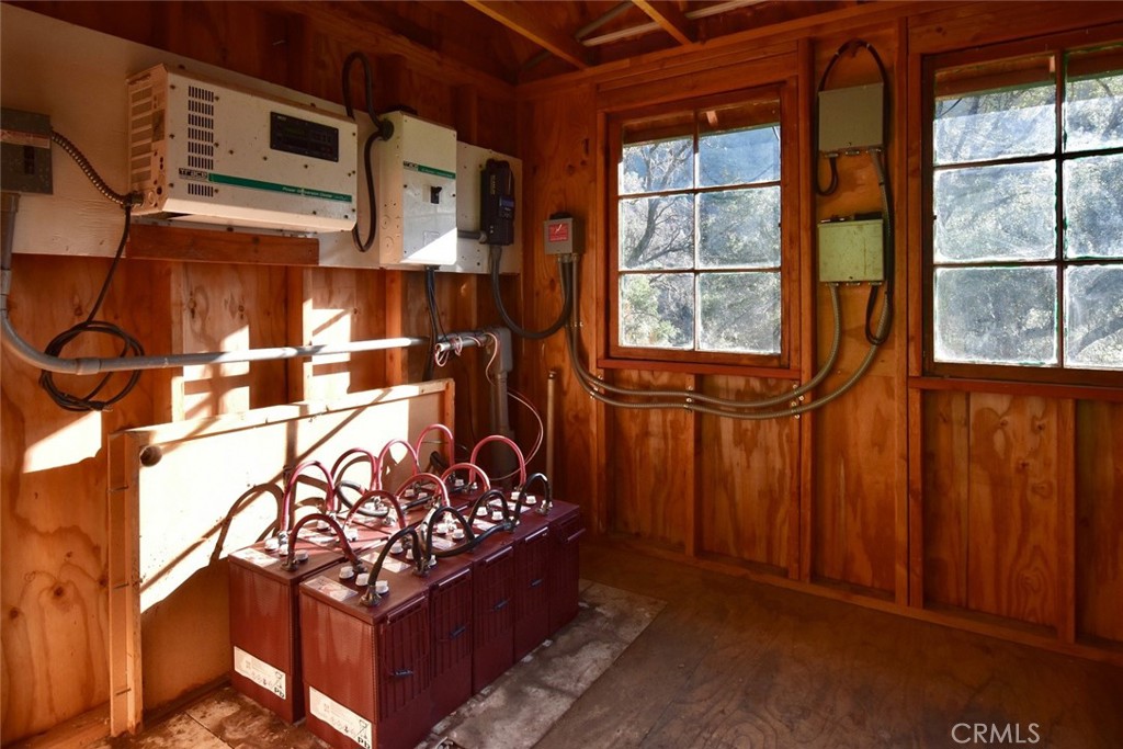 76450 Deer Pass Road Bradley, CA 93426 - Photo 29 of 50 a bed room with a bed and a window