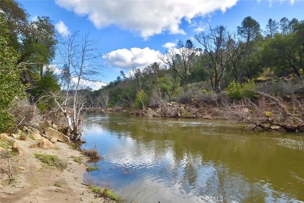 76450 Deer Pass Road Bradley, CA 93426 - Photo 36 of 50 a view of a lake with a mountain in the background