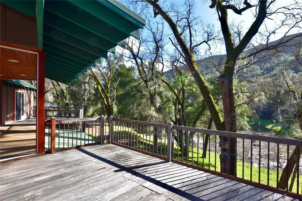 76450 Deer Pass Road Bradley, CA 93426 - Photo 5 of 50 a view of balcony with wooden floor and fence