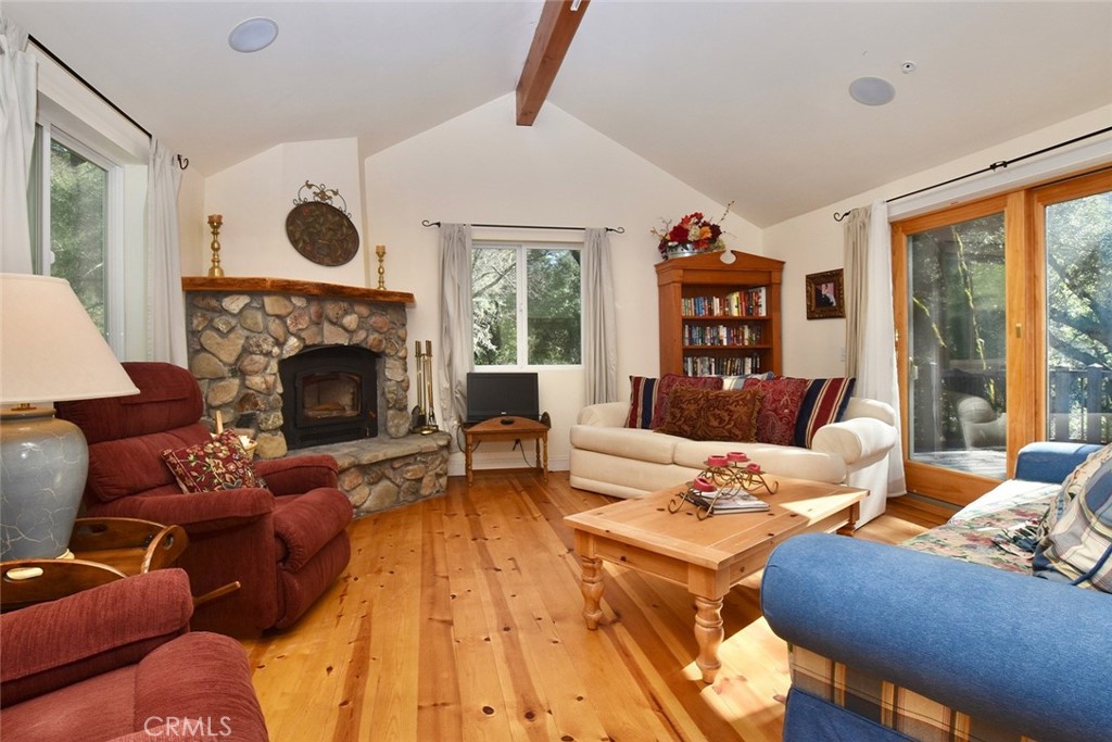 76450 Deer Pass Road Bradley, CA 93426 - Photo 8 of 50 a living room with furniture and a fireplace