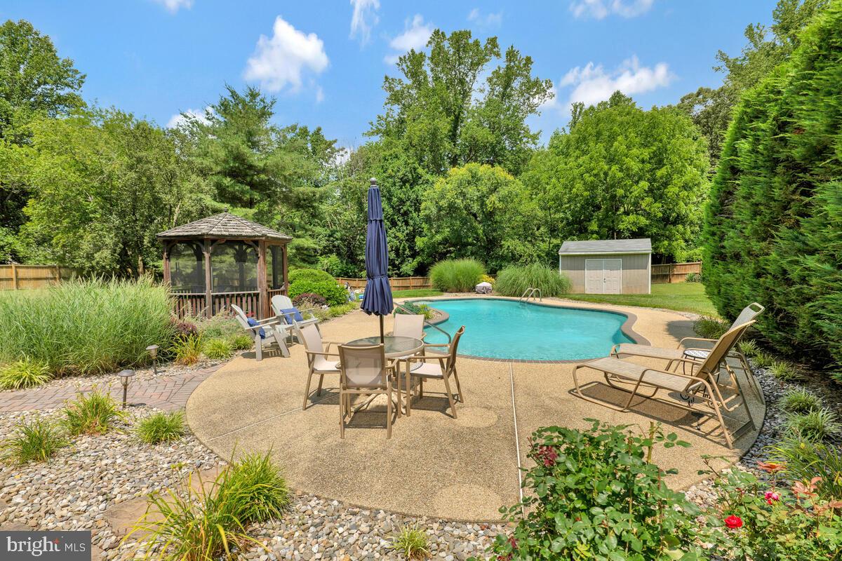 9580 Howes Road Dunkirk, MD 20754 - Photo 34 of 51 patio around pool