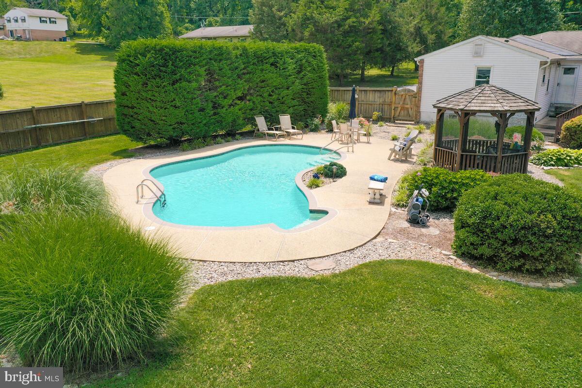 9580 Howes Road Dunkirk, MD 20754 - Photo 44 of 51 landscaped backyard