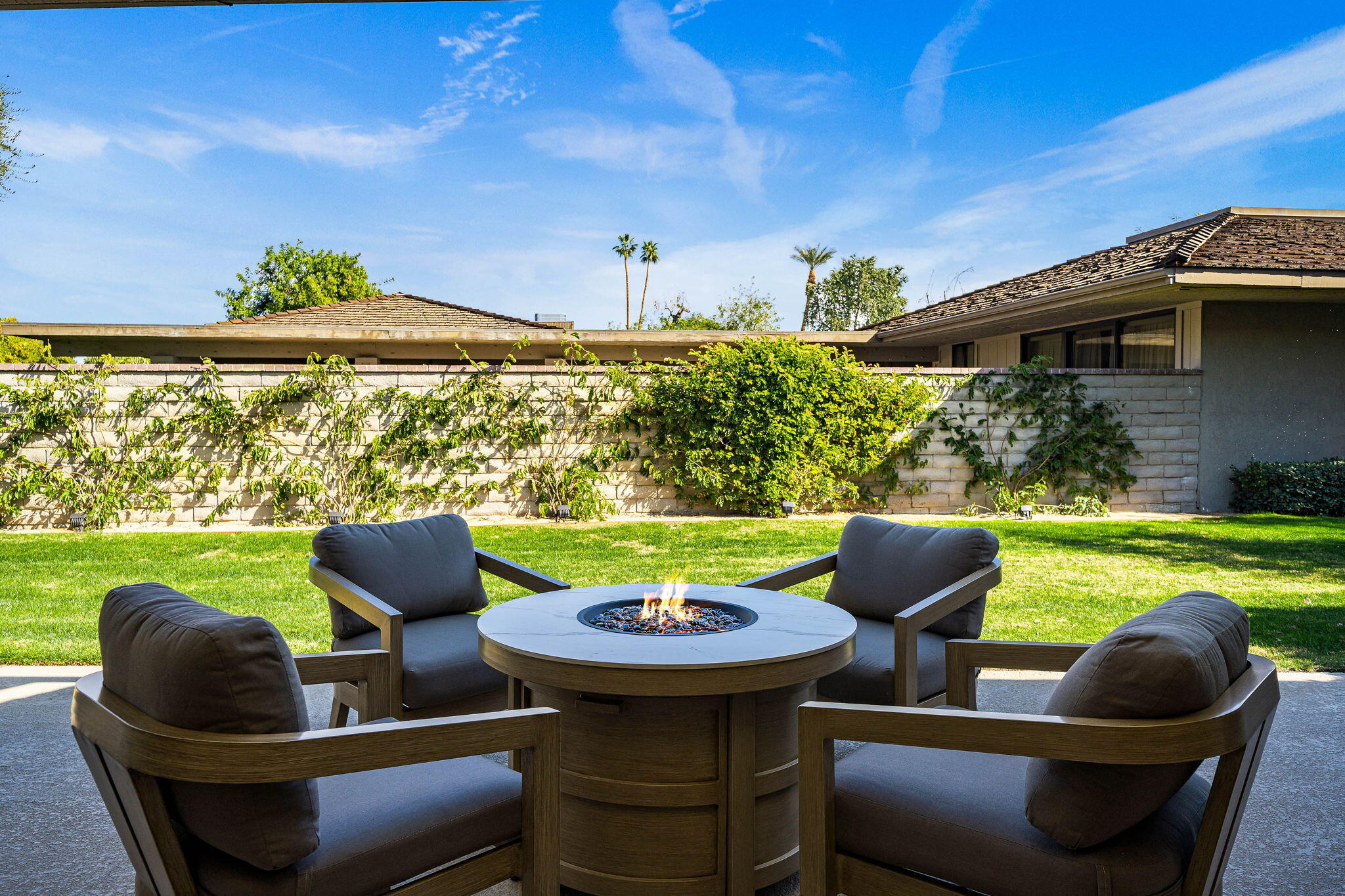 1 Cornell Drive Rancho Mirage, CA 92270 - Photo 18 of 46 Backyard Firepit Seating Area