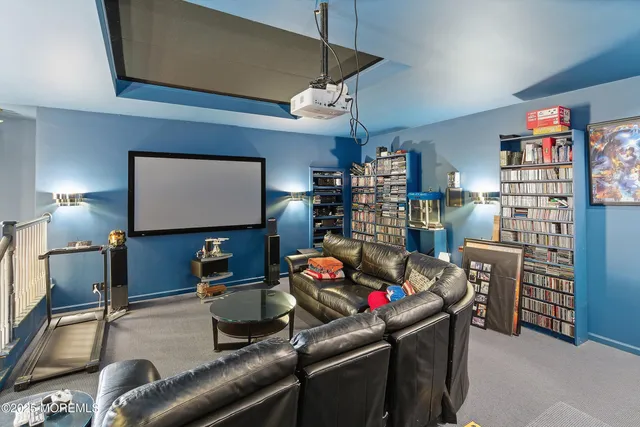 a room with furniture and a flat screen tv