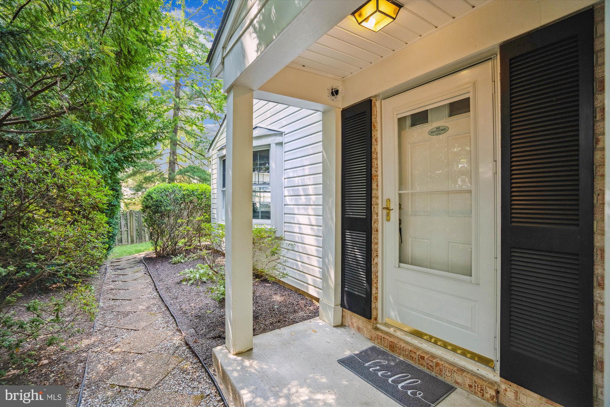 5447 Woodenhawk Circle Columbia, MD 21044 - Photo 3 of 51 COVERED ENTRY & LANDSCAPED WALKWAY TO BACKYARD