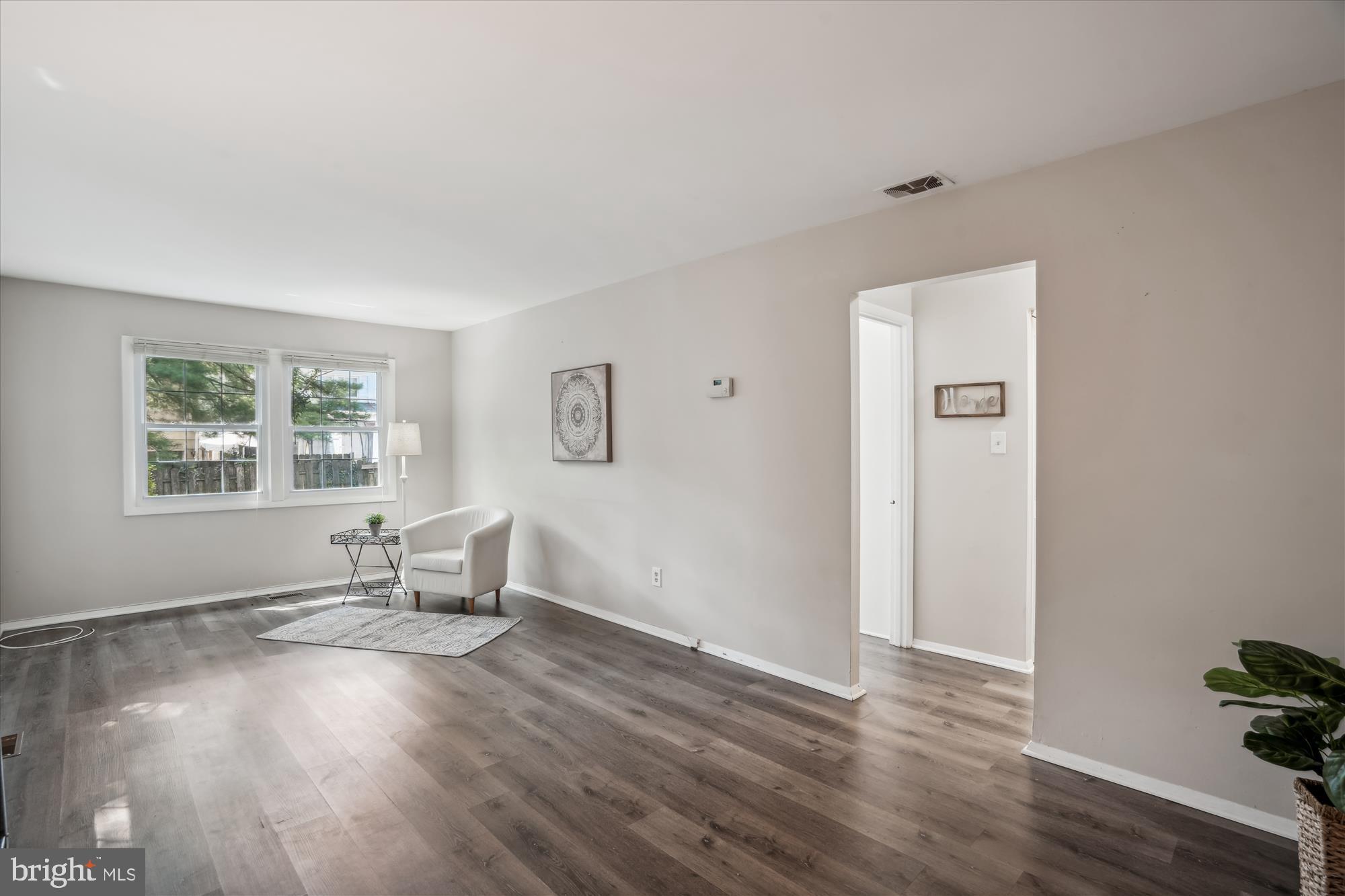 5447 Woodenhawk Circle Columbia, MD 21044 - Photo 6 of 51 LIGHT-FILLED LIVING ROOM