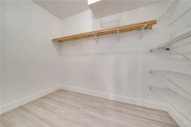 a view of an empty walk in closet