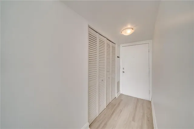 a view of a livingroom with wooden floor