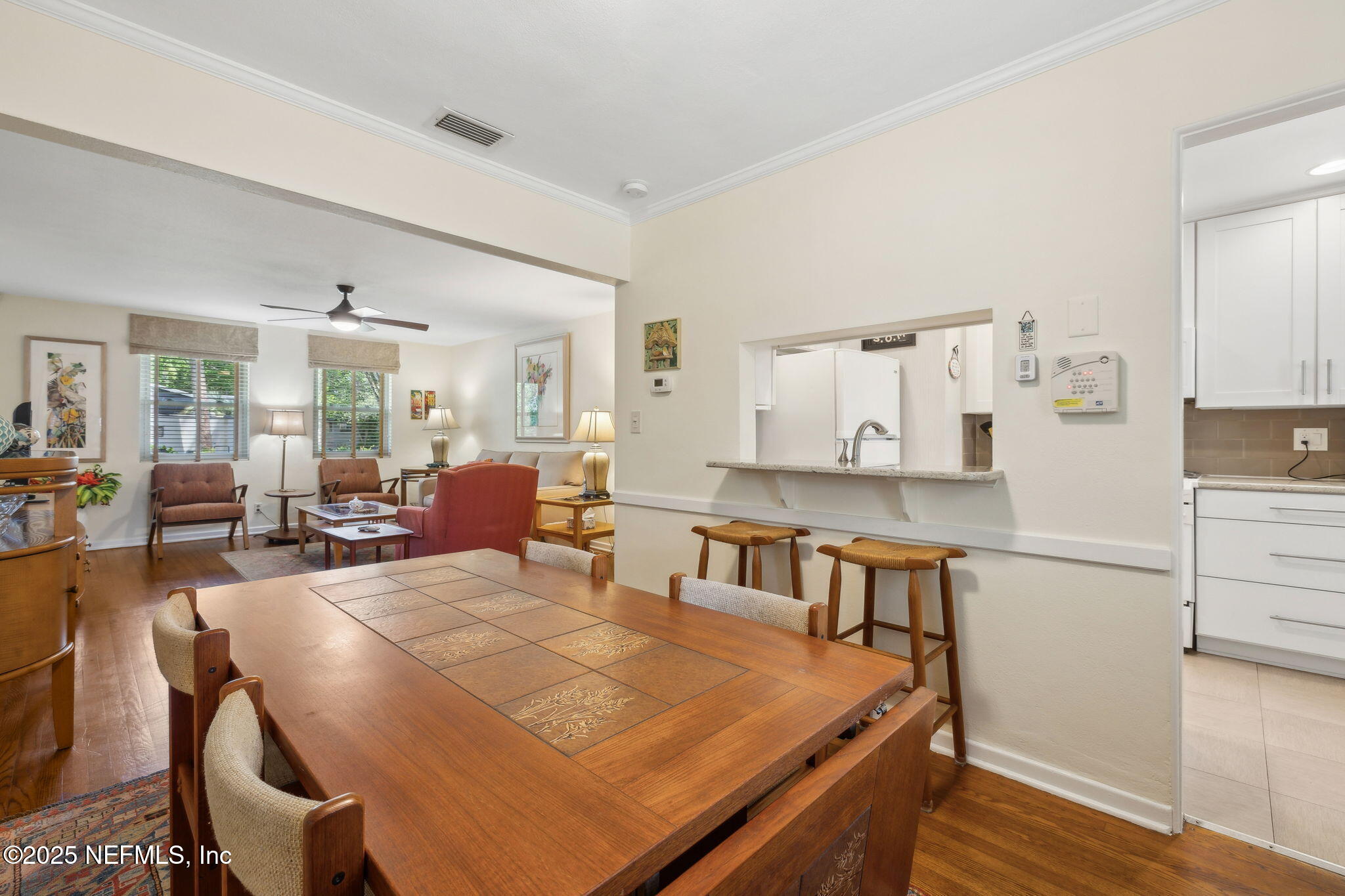 4504 Milstead Road Jacksonville, FL 32210 - Photo 15 of 33 a bed room with a bed and furniture
