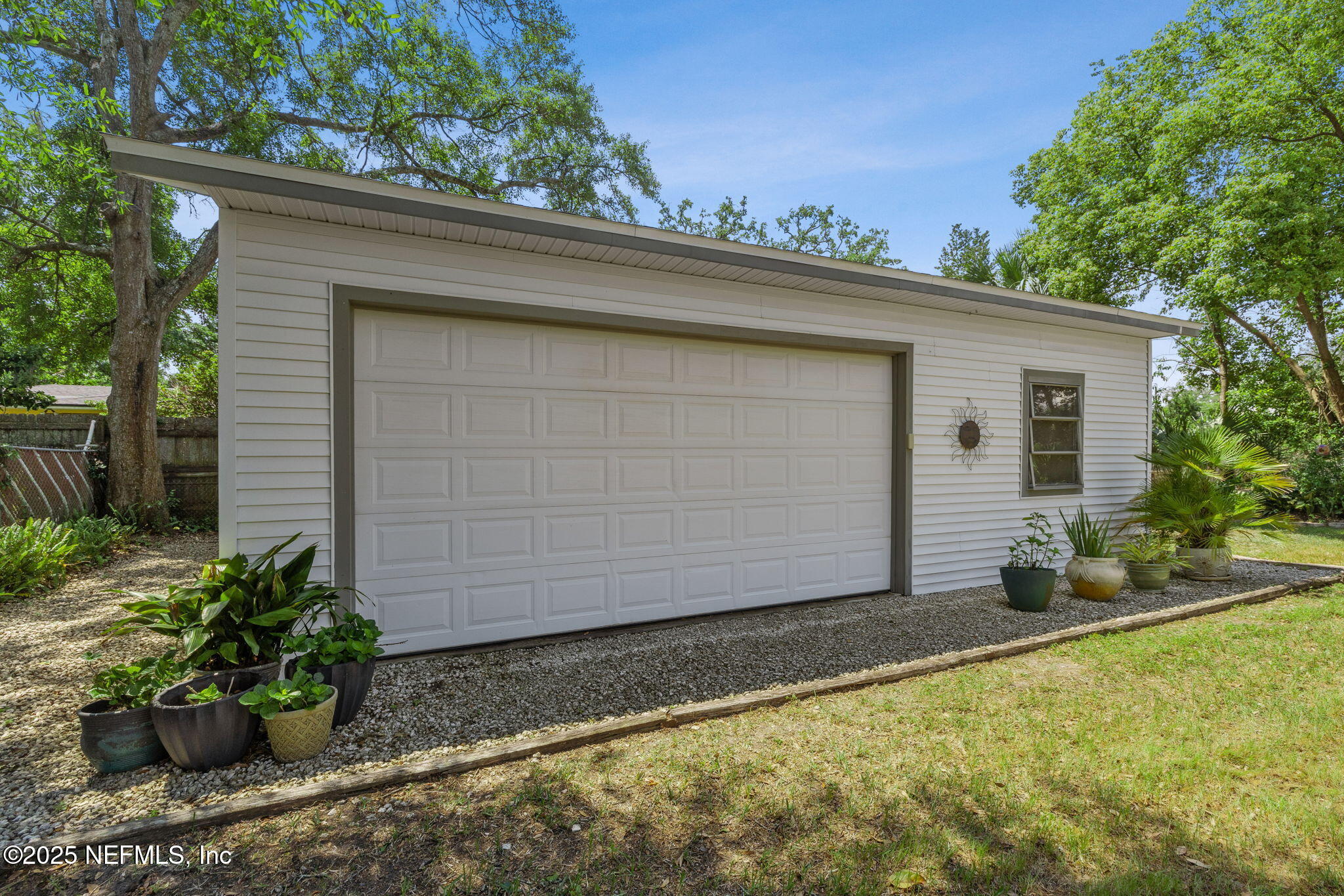 4504 Milstead Road Jacksonville, FL 32210 - Photo 29 of 33 a backyard of a house