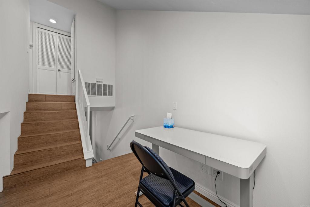 368 Hemlock Avenue Carlsbad, CA 92008 - Photo 16 of 32 a view of a room with wooden floor and stairs
