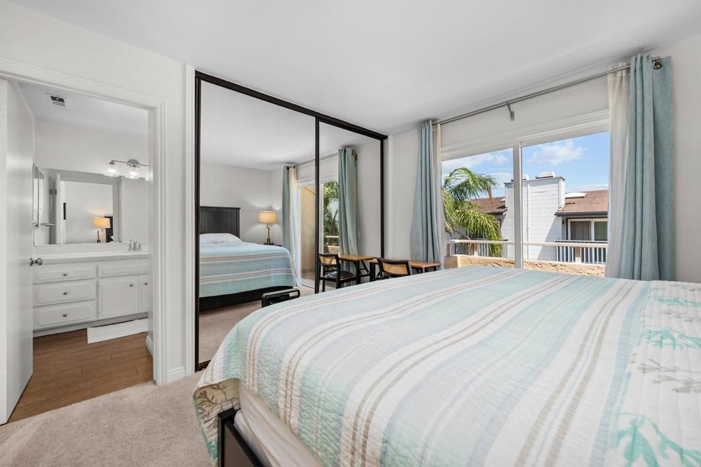 368 Hemlock Avenue Carlsbad, CA 92008 - Photo 18 of 32 a bedroom with a bed and a large window