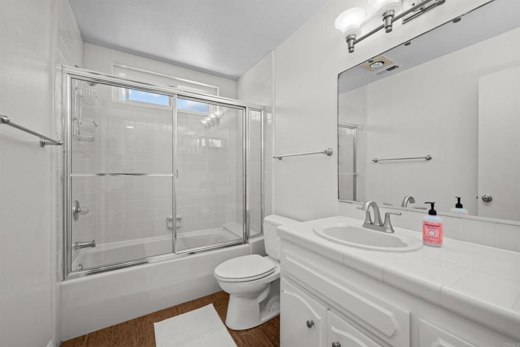 368 Hemlock Avenue Carlsbad, CA 92008 - Photo 24 of 32 a bathroom with a sink toilet and shower