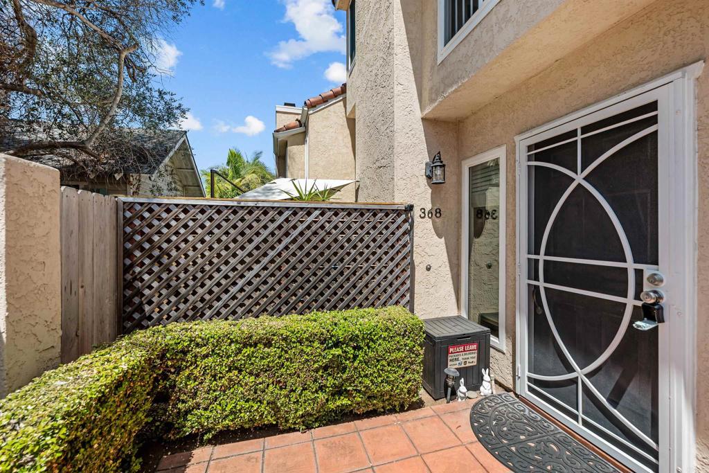 368 Hemlock Avenue Carlsbad, CA 92008 - Photo 4 of 32 a view of a chair and table in the patio