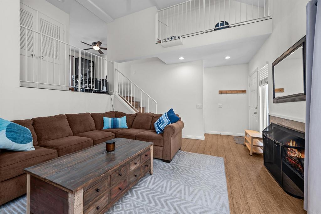 368 Hemlock Avenue Carlsbad, CA 92008 - Photo 6 of 32 a living room with furniture and a fireplace