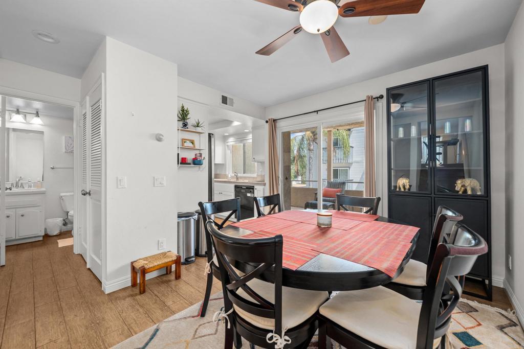 368 Hemlock Avenue Carlsbad, CA 92008 - Photo 10 of 32 a view of a dining room with furniture window and wooden floor