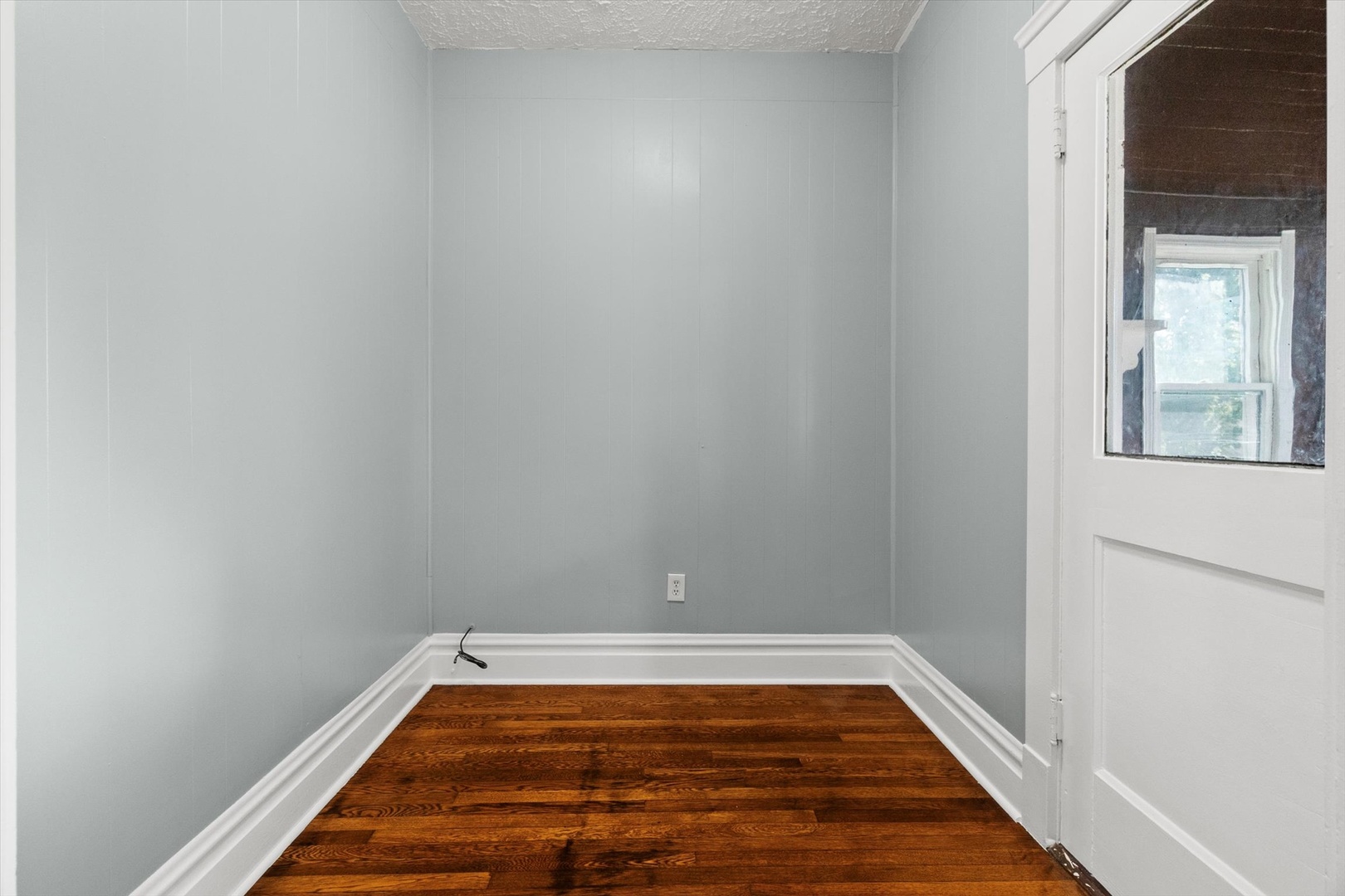820 East 89th Place, Unit 2 Chicago, IL 60619 - Photo 13 of 15 a view of a room with wooden floor and small space