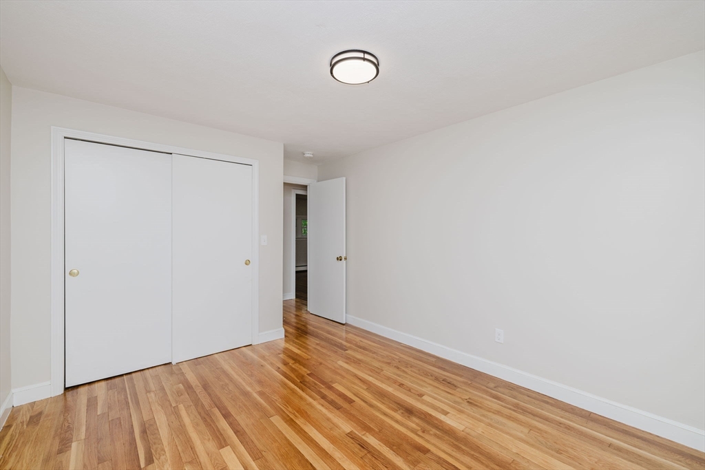 24 Sagamore Road Attleboro, MA 02703 - Photo 28 of 39 a view of empty room with wooden floor