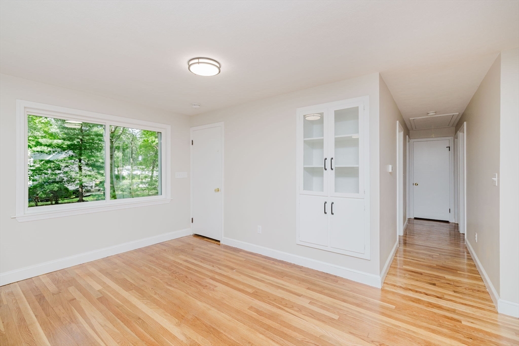 24 Sagamore Road Attleboro, MA 02703 - Photo 33 of 39 a view of empty room with wooden floor and fan