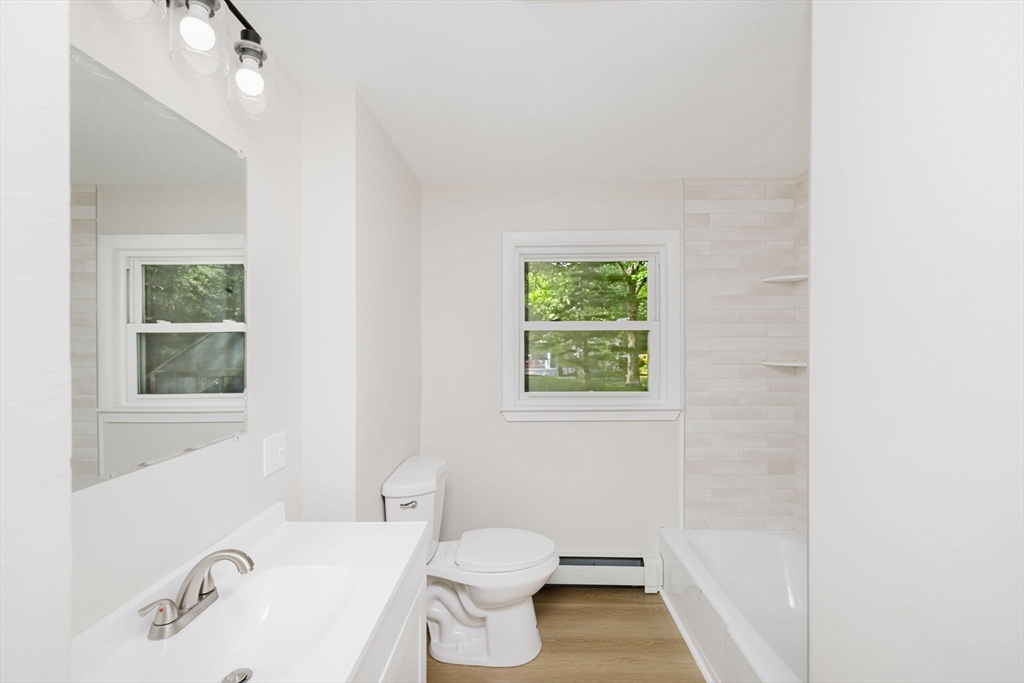 24 Sagamore Road Attleboro, MA 02703 - Photo 35 of 39 a bathroom with a sink a toilet and shower