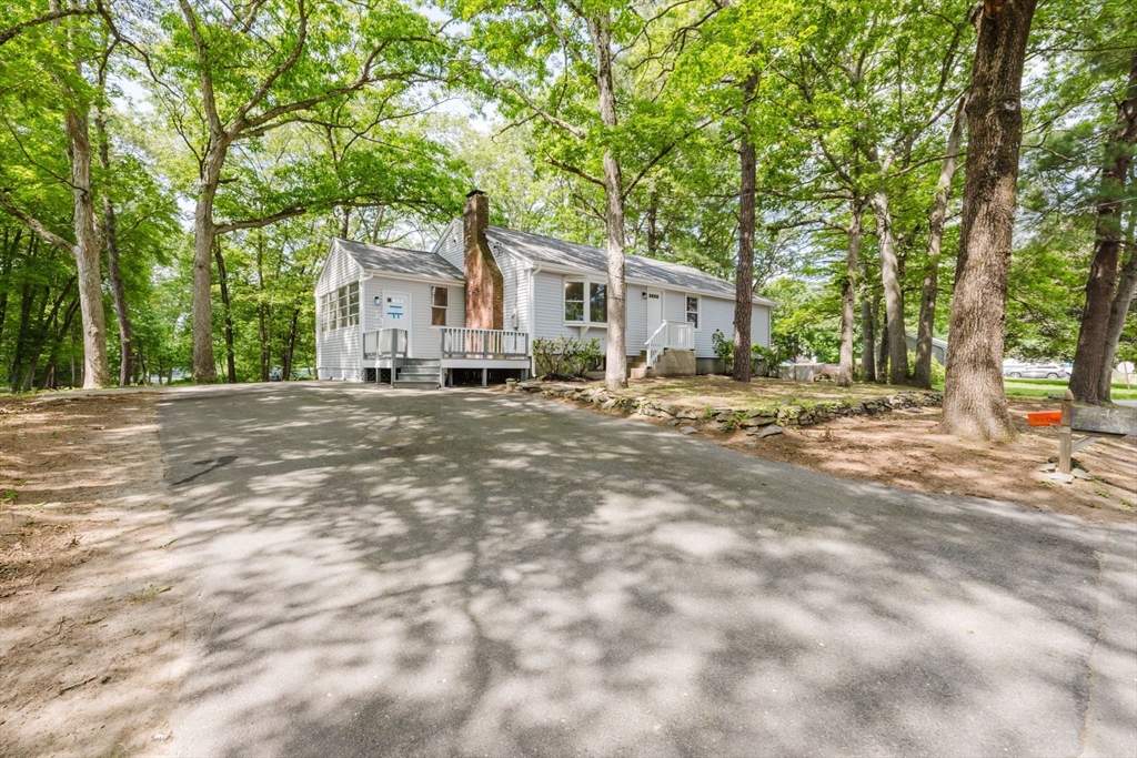 24 Sagamore Road Attleboro, MA 02703 - Photo 4 of 39 a front view of a house with a yard