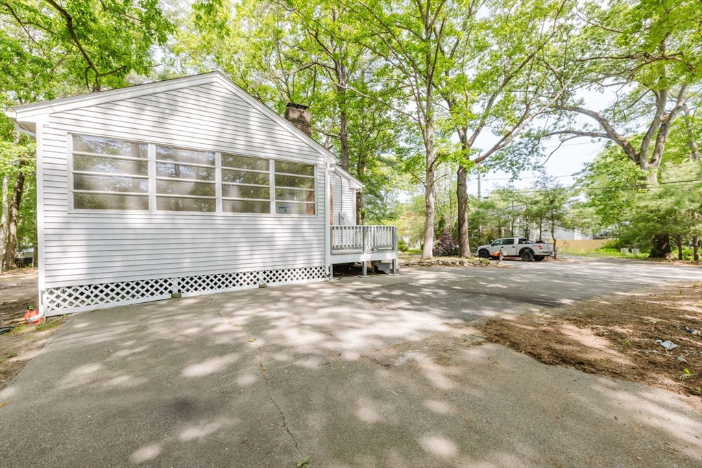 24 Sagamore Road Attleboro, MA 02703 - Photo 9 of 39 a view of house with yard and trees in the background