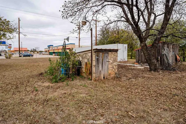 a backyard of a house with lots of green space