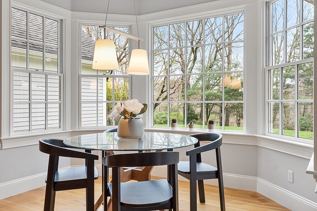 257 Nashoba Road Concord, MA 01742 - Photo 12 of 41 a view of a dining room with furniture window and wooden floor