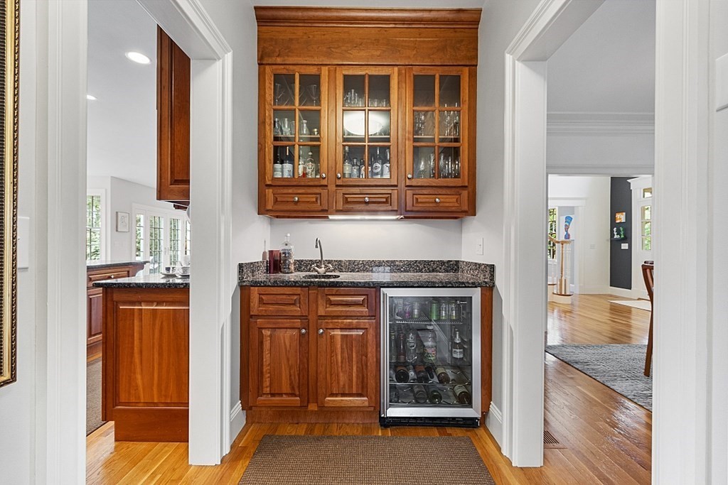 257 Nashoba Road Concord, MA 01742 - Photo 15 of 41 a kitchen with stainless steel appliances granite countertop a stove and a refrigerator