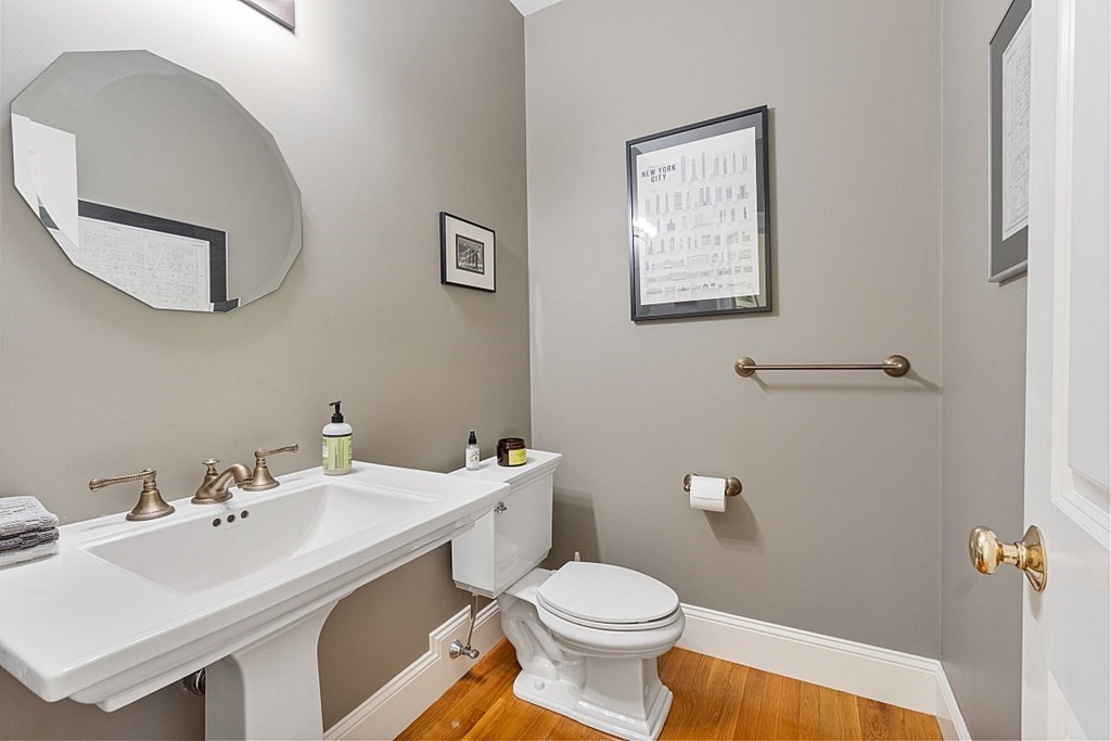 257 Nashoba Road Concord, MA 01742 - Photo 16 of 41 a bathroom with a sink mirror and toilet