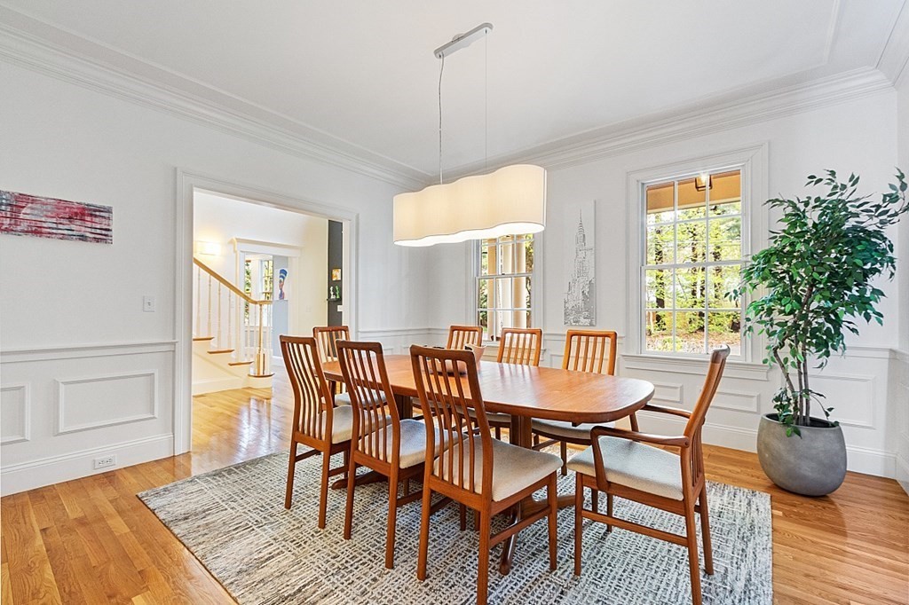 257 Nashoba Road Concord, MA 01742 - Photo 17 of 41 a view of a dining room with furniture window and wooden floor